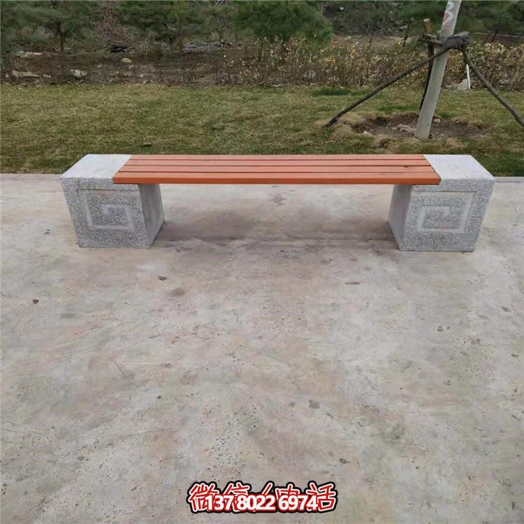 公園街邊擺放休閑實(shí)木花崗巖長(zhǎng)形石凳